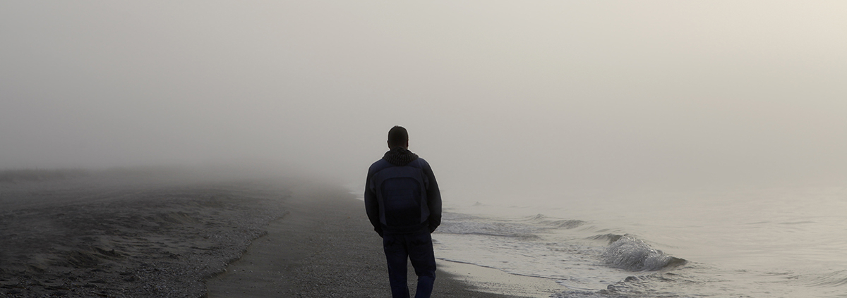 Man walking on beach