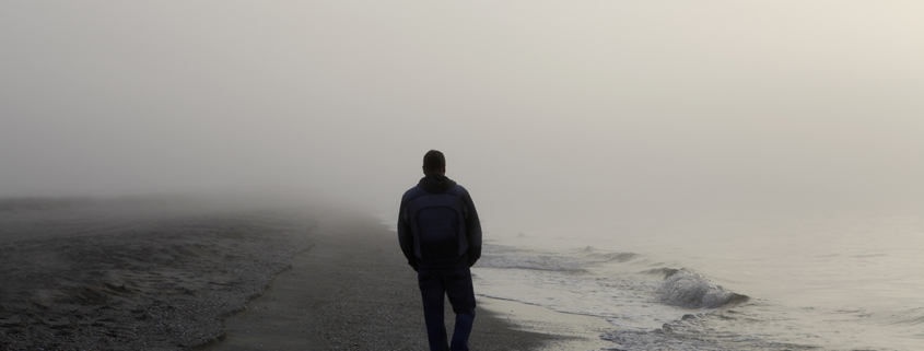 Man walking on beach